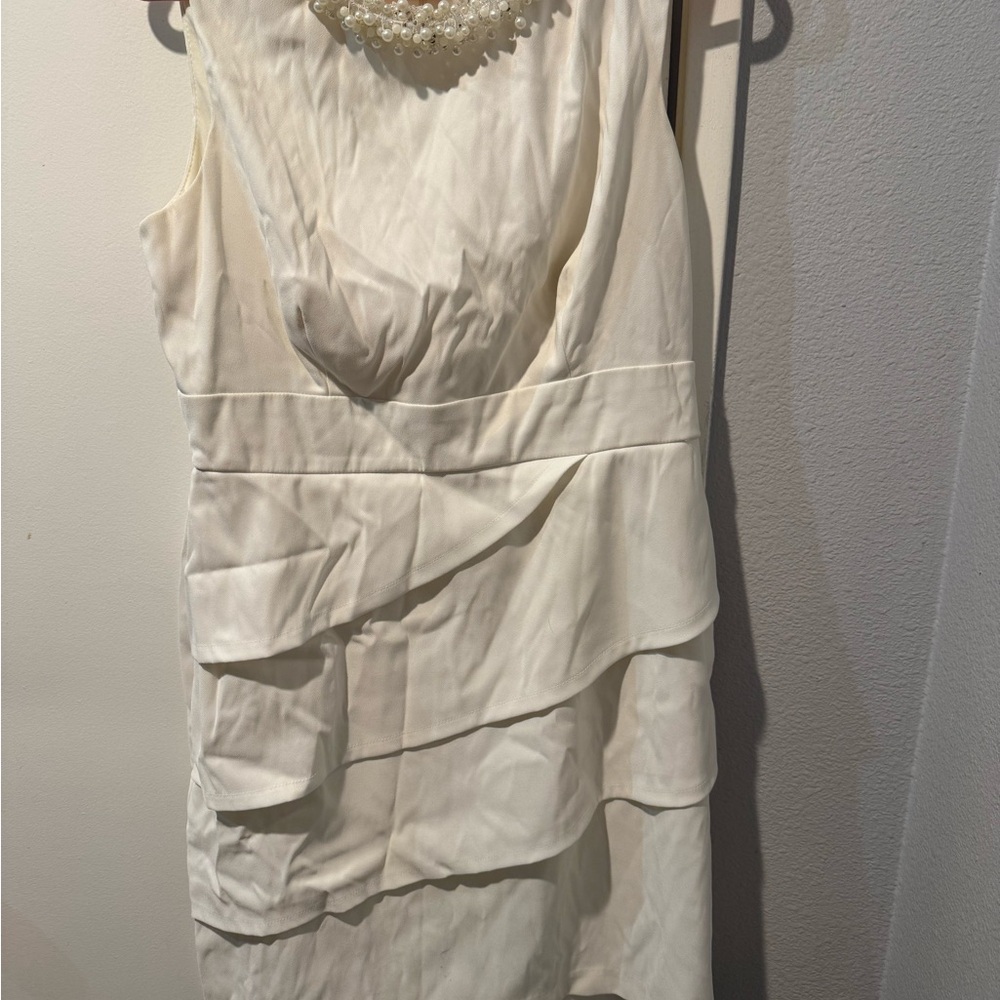 Elegant White Sleeveless Dress with Pearl Detail